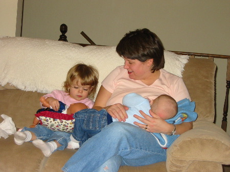 Hannah feeds her baby like mommy