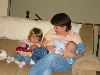 Hannah feeds her baby like mommy